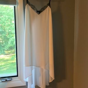 White bcbg slip dress with black lace detail